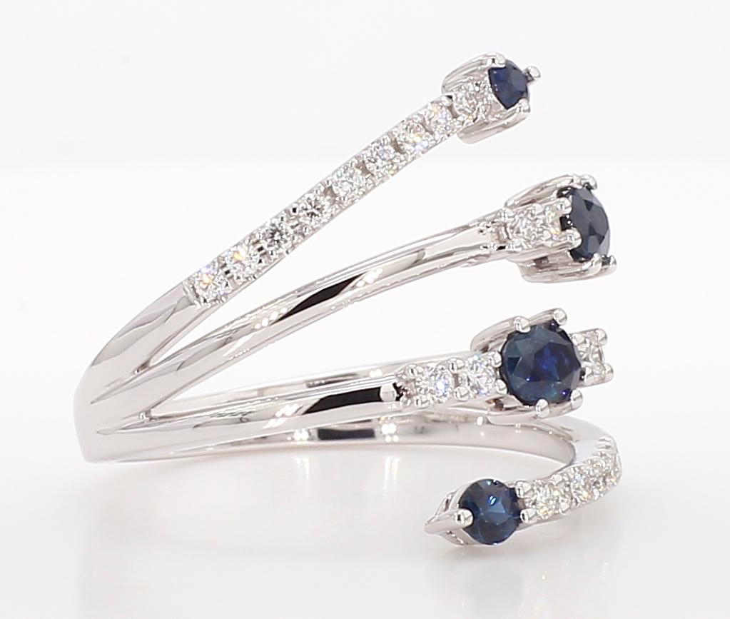 Oval Cut Natural Blue Oval Sapphire and White Diamond 0.90 Carat TW Gold Cocktail Ring For Sale
