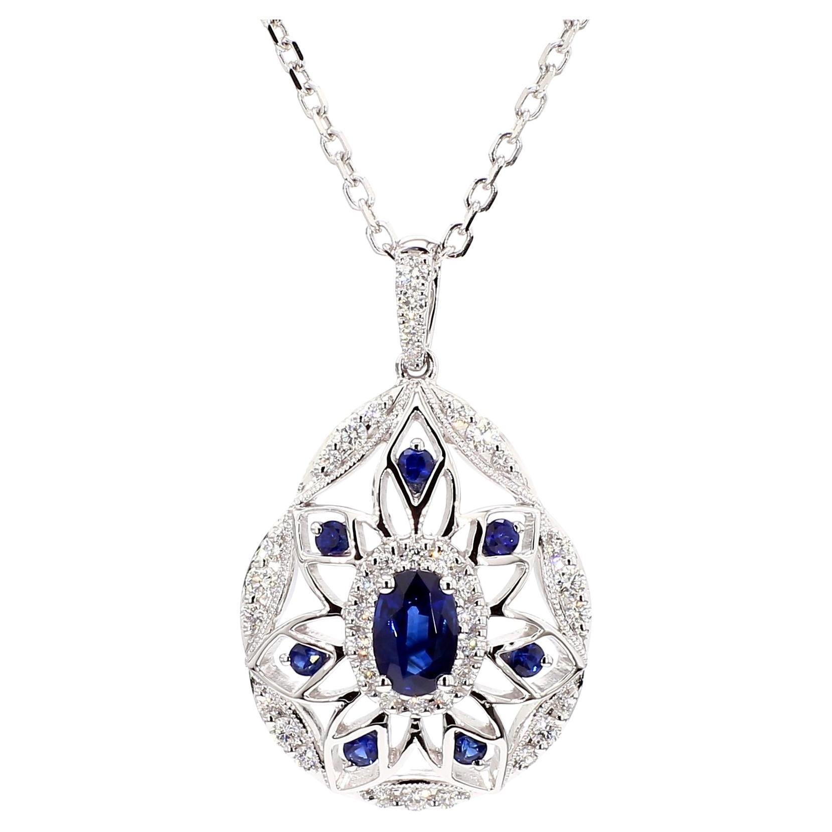 Natural Blue Oval Sapphire and White Diamond 1.08 Carat TW Gold Drop Pendant