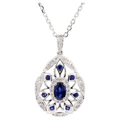 Natural Blue Oval Sapphire and White Diamond 1.08 Carat TW Gold Drop Pendant