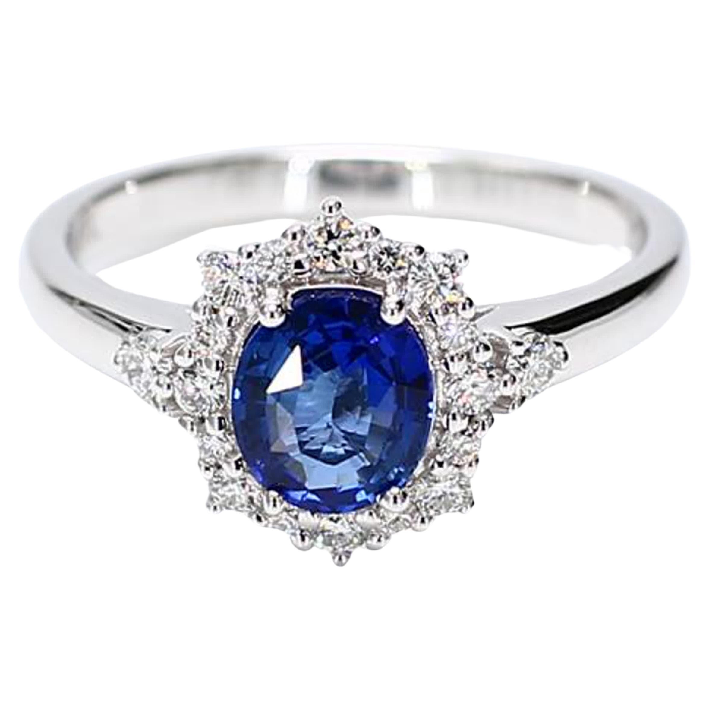 Natural Blue Oval Sapphire and White Diamond 1.27 Carat TW Gold Cocktail Ring For Sale