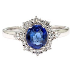 Anillo de cóctel de oro con zafiro ovalado azul natural y diamante blanco de 1.27 quilates TW