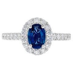 Natural Blue Oval Sapphire and White Diamond 1.47 Carat TW Gold Cocktail Ring