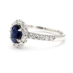 Natural Blue Oval Sapphire and White Diamond 1.59 Carat TW Gold Cocktail Ring