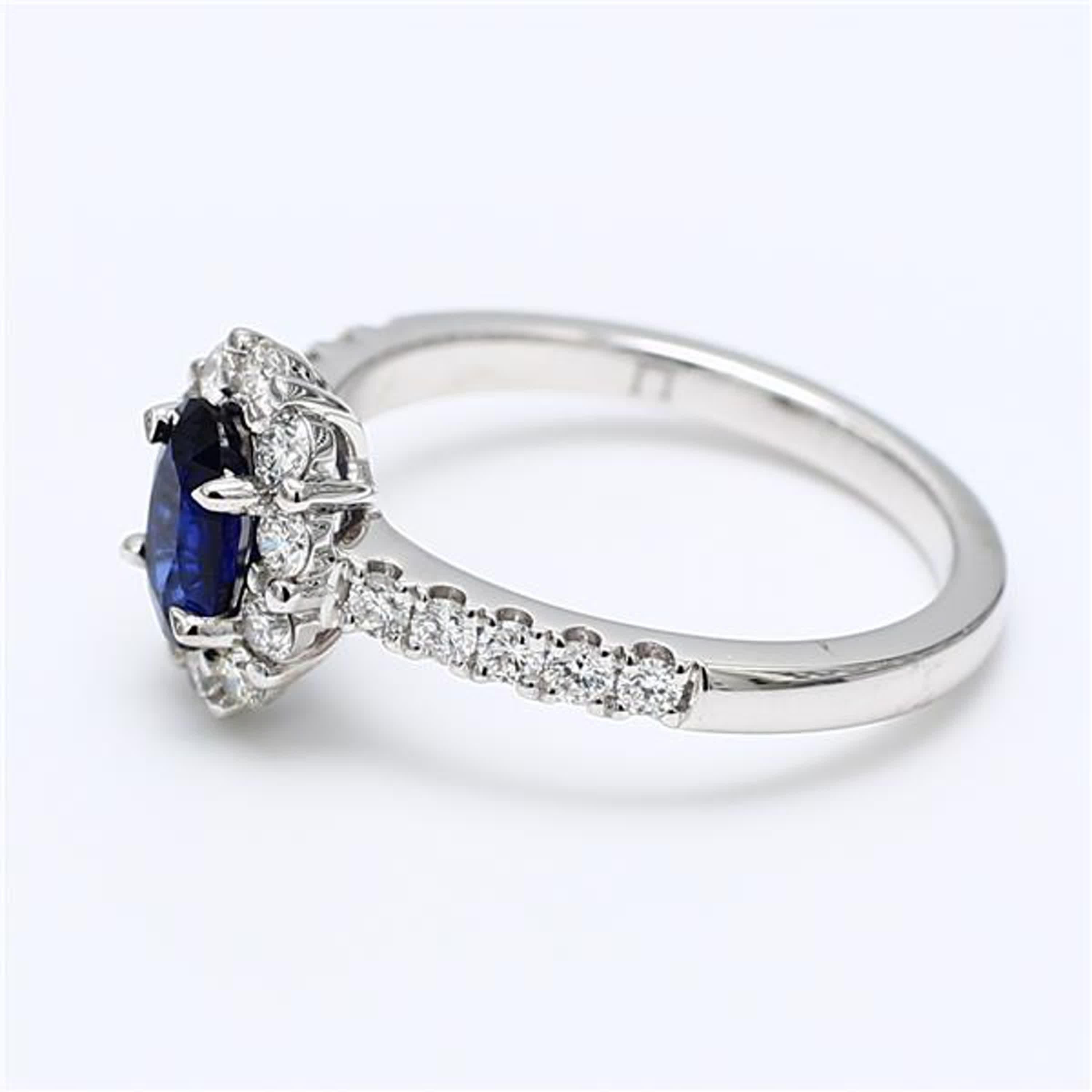 Contemporary Natural Blue Oval Sapphire and White Diamond 1.59 Carat TW Gold Cocktail Ring For Sale