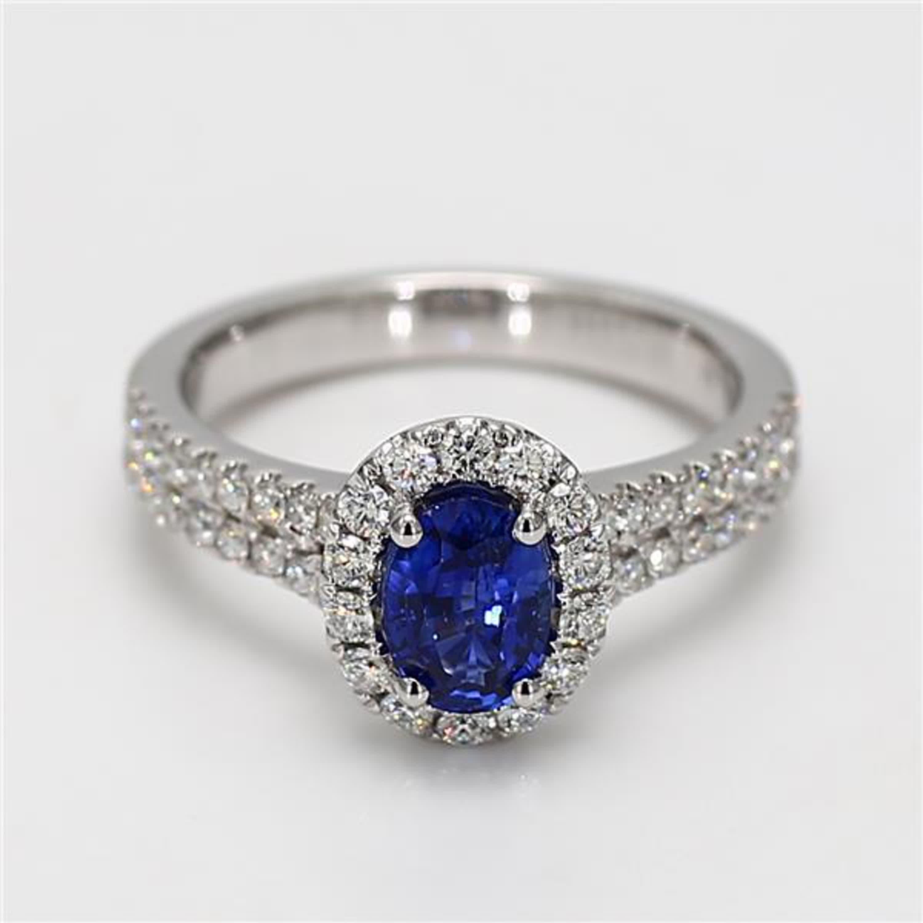 Contemporary Natural Blue Oval Sapphire and White Diamond 1.60 Carat TW Gold Cocktail Ring For Sale