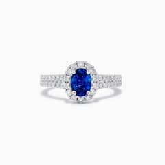 Natural Blue Oval Sapphire and White Diamond 1.60 Carat TW Gold Cocktail Ring