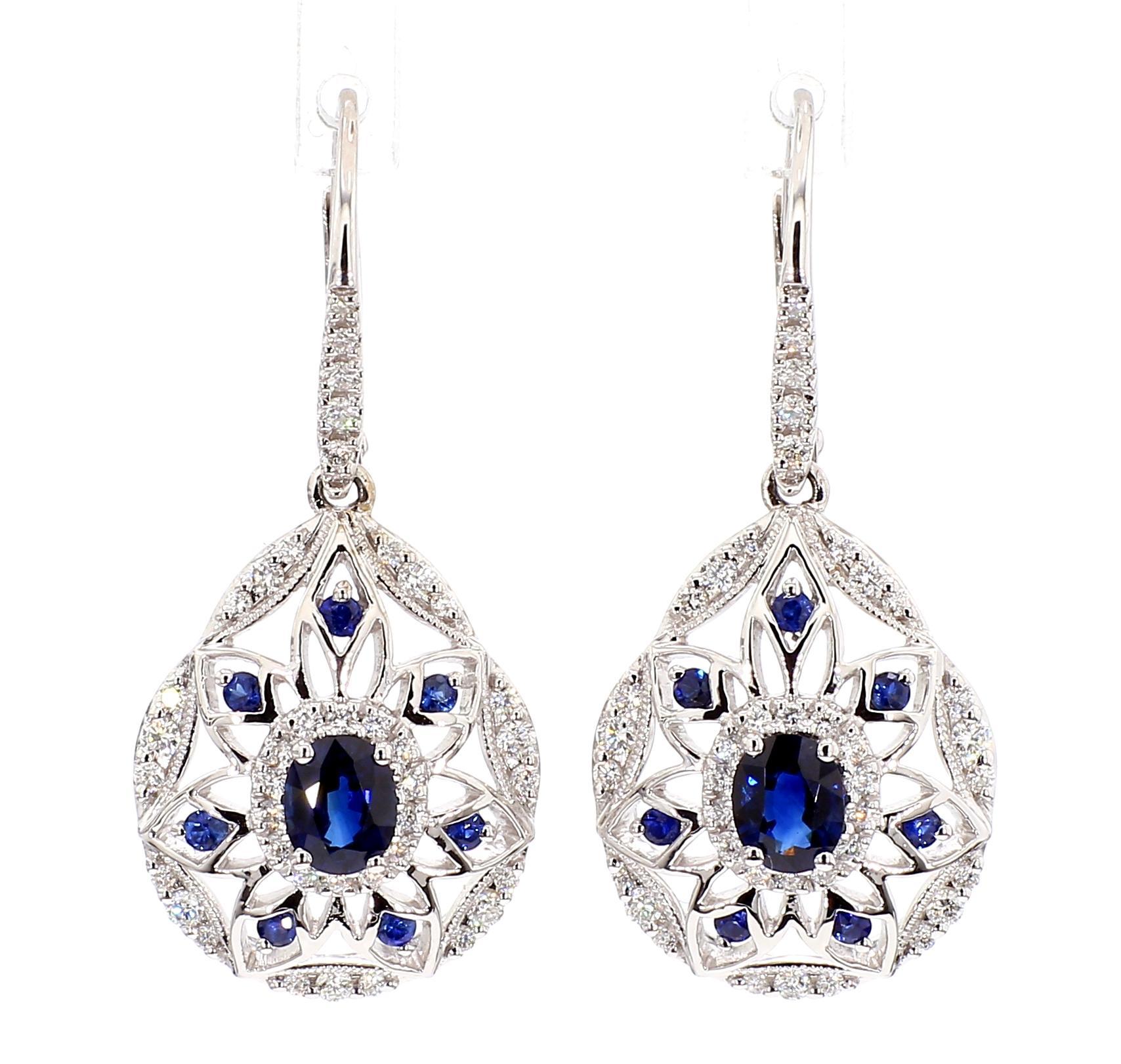 Contemporary Natural Blue Oval Sapphire and White Diamond 1.67 Carat TW Gold Drop Earrings For Sale