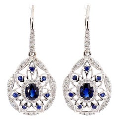 Natural Blue Oval Sapphire and White Diamond 1.67 Carat TW Gold Drop Earrings