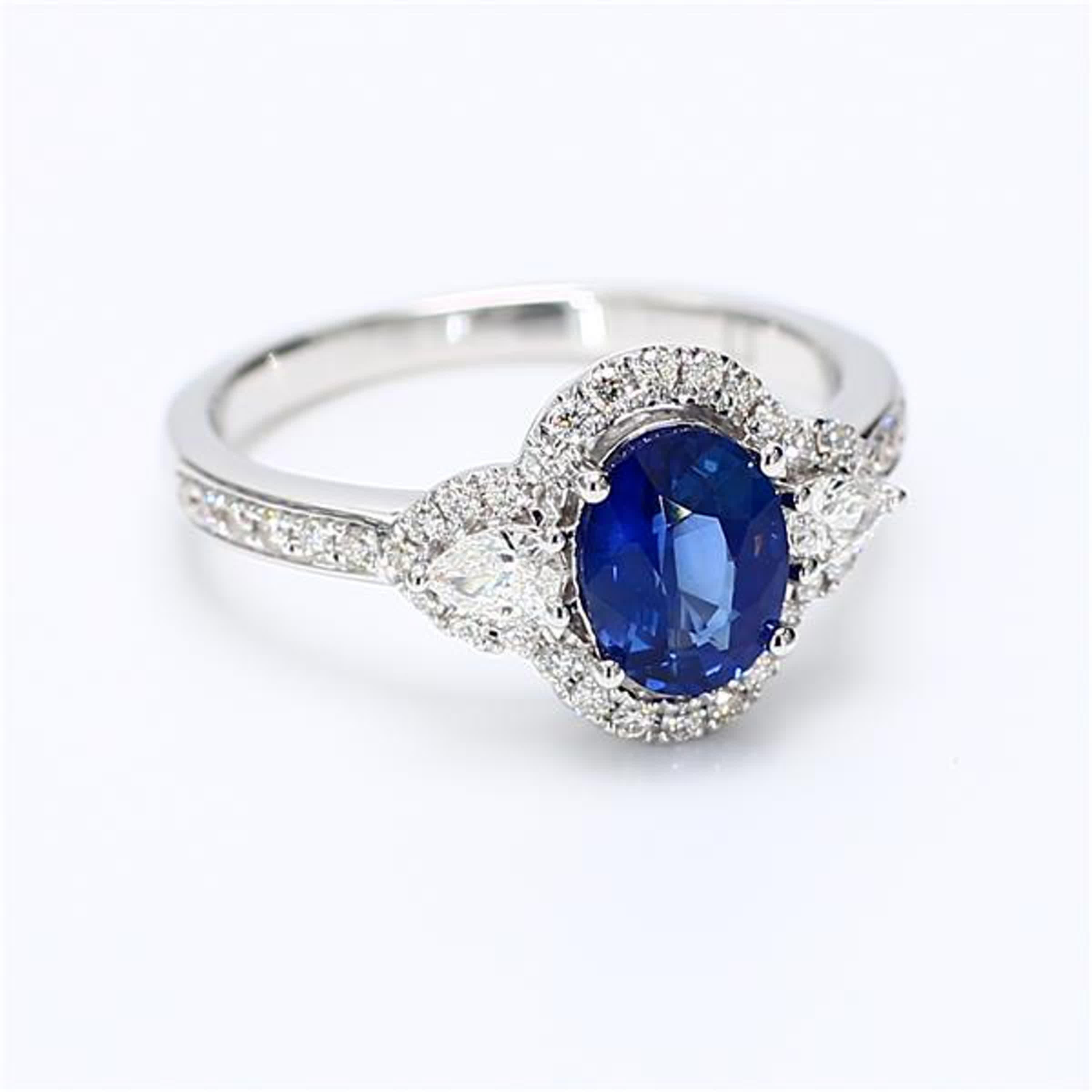 Natural Blue Oval Sapphire and White Diamond 1.70 Carat TW Gold Cocktail Ring For Sale 1