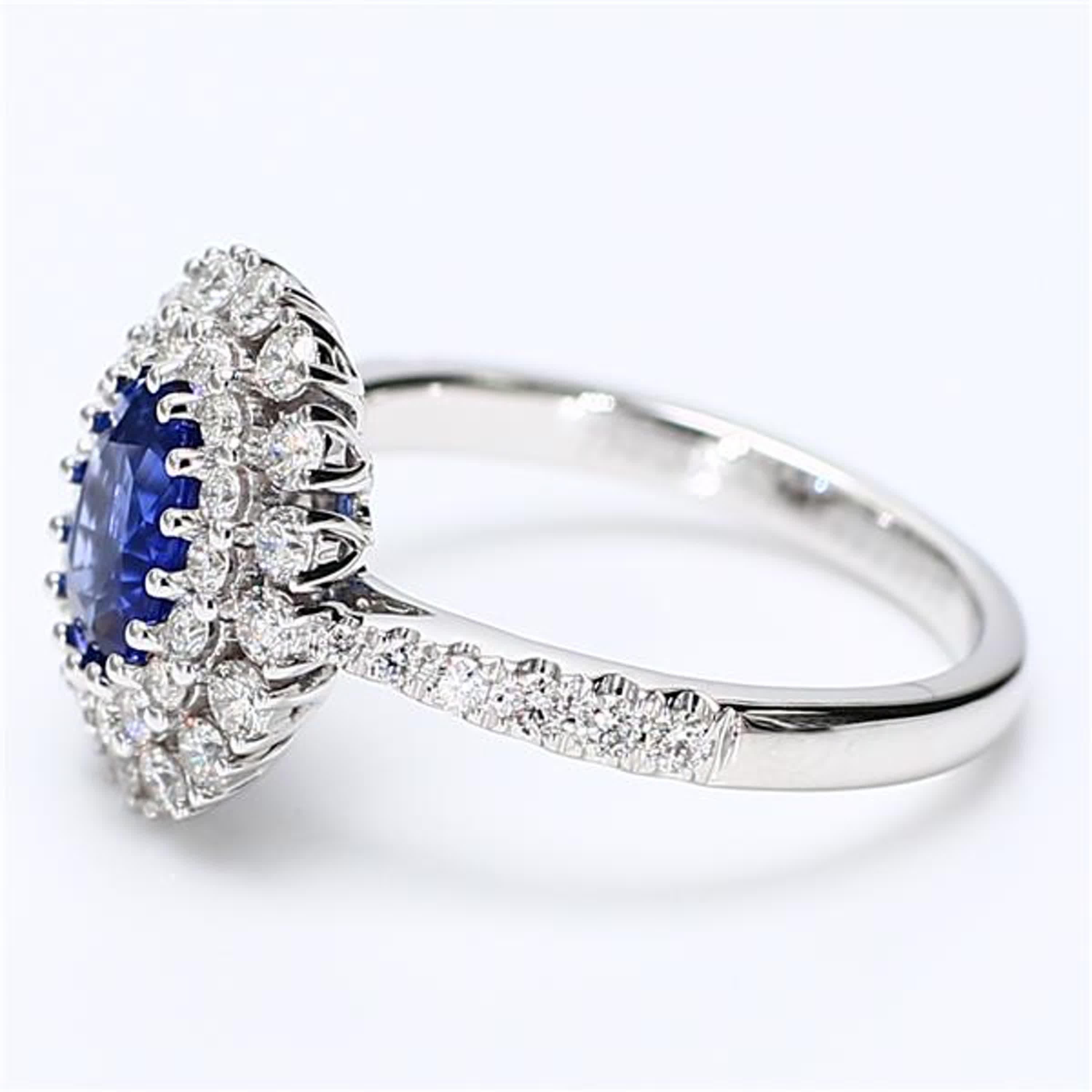 Contemporary Natural Blue Oval Sapphire and White Diamond 1.85 Carat TW Gold Cocktail Ring For Sale