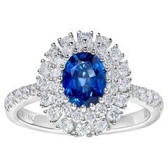 Natural Blue Oval Sapphire and White Diamond 1.85 Carat TW Gold Cocktail Ring