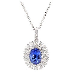 Colgante gota de oro zafiro ovalado azul natural y diamante blanco 1.86 quilates TW