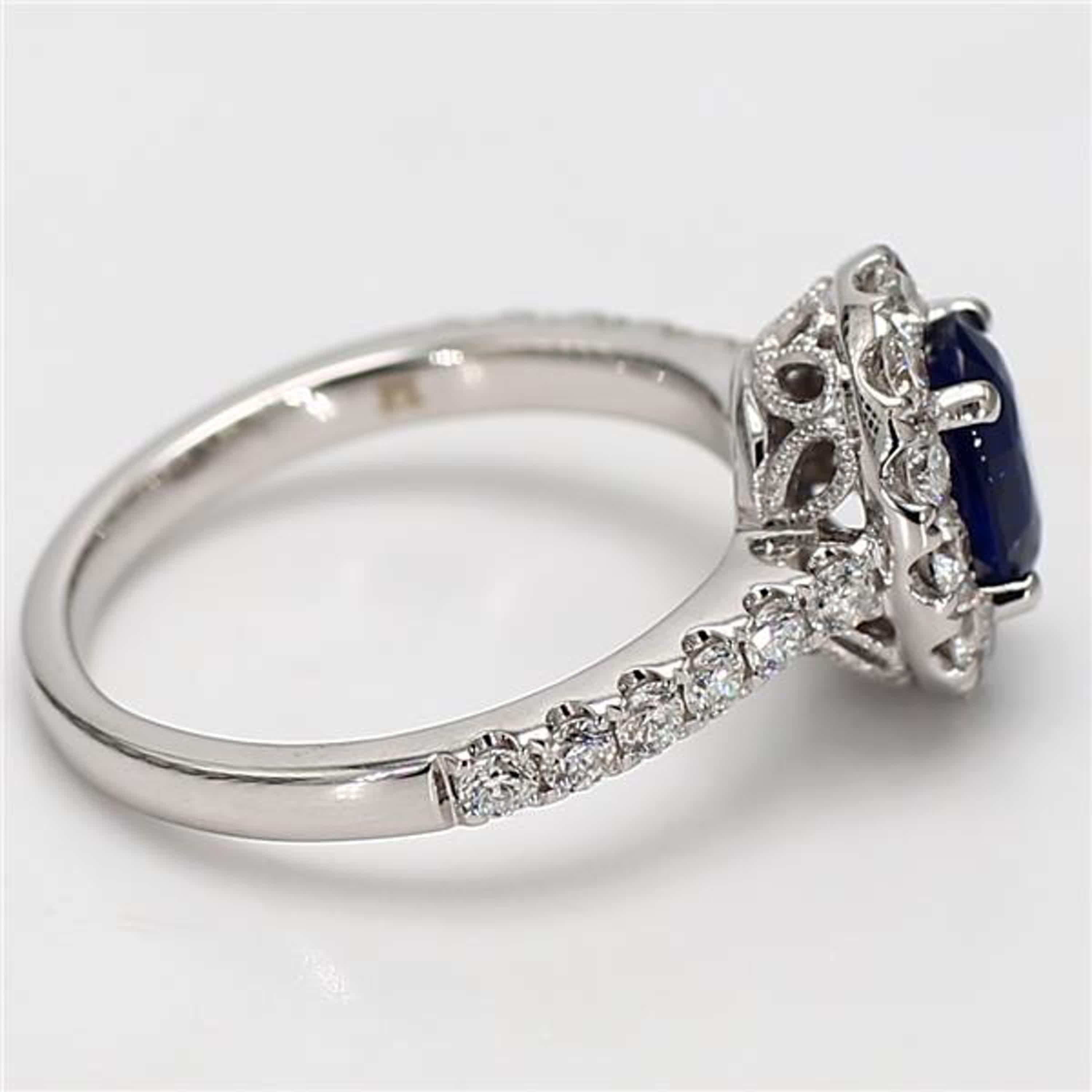 Natural Blue Oval Sapphire and White Diamond 1.88 Carat TW Gold Cocktail Ring For Sale 1