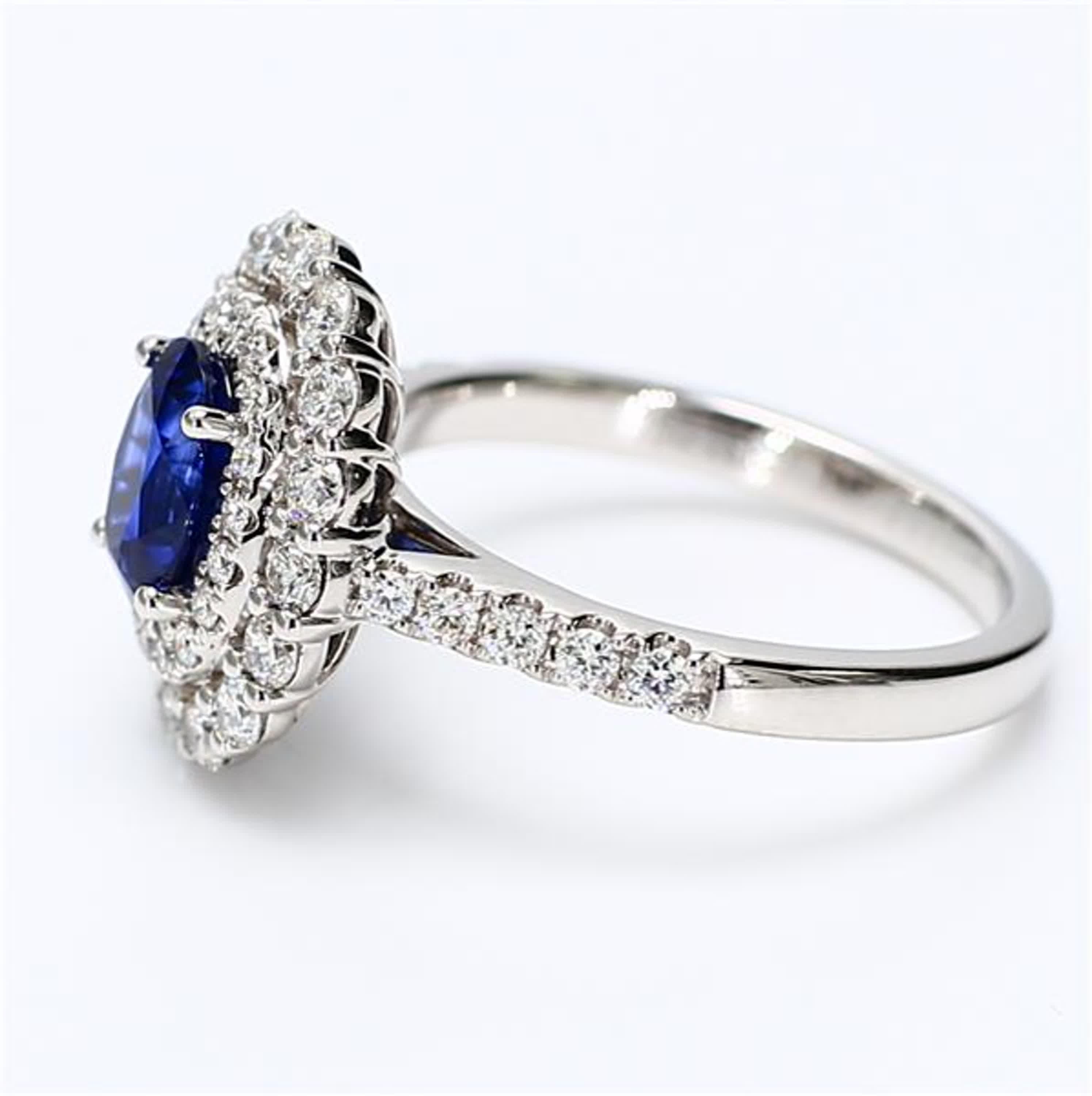 Contemporary Natural Blue Oval Sapphire and White Diamond 1.97 Carat TW Gold Cocktail Ring For Sale