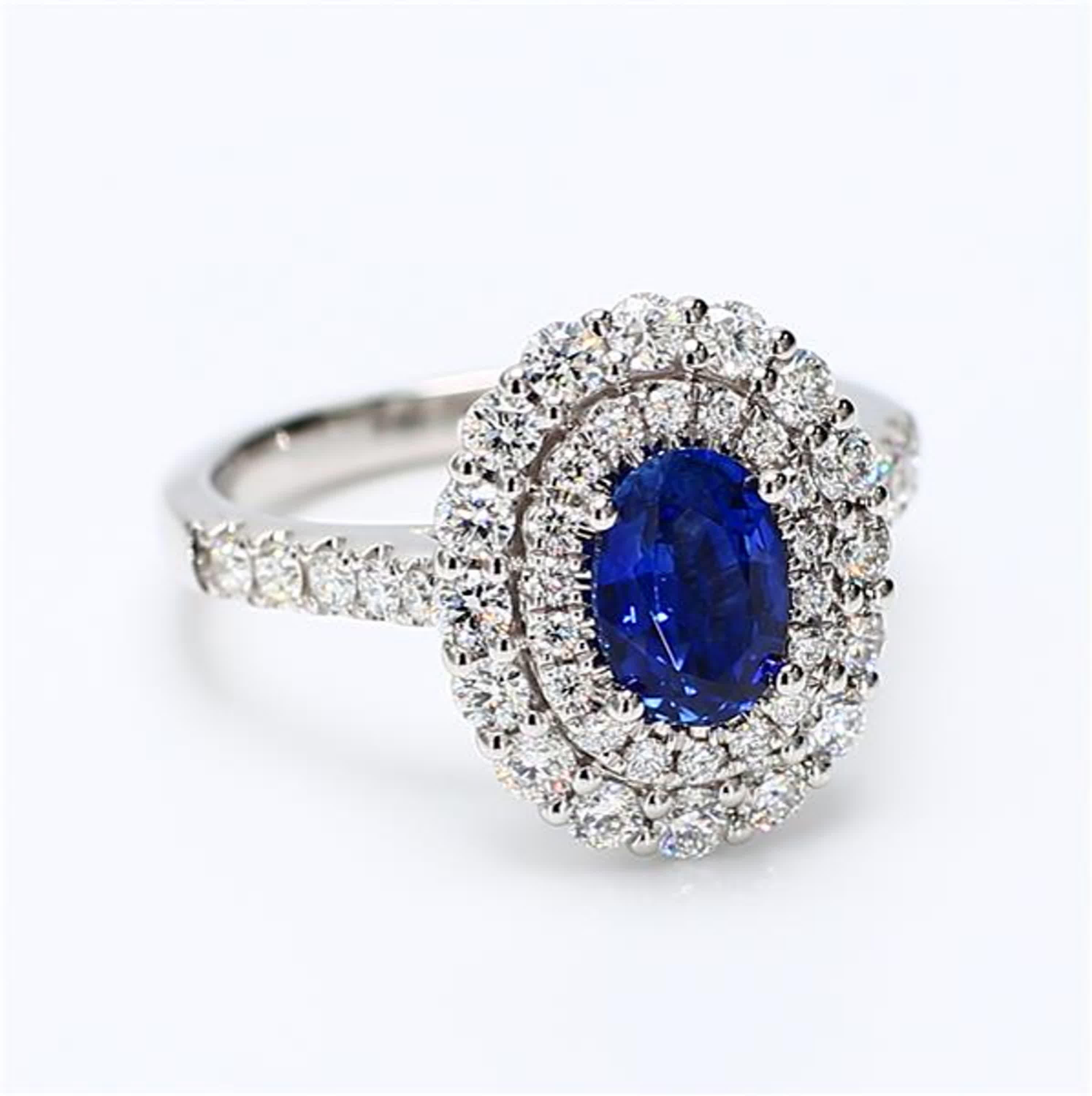 Natural Blue Oval Sapphire and White Diamond 1.97 Carat TW Gold Cocktail Ring For Sale 1