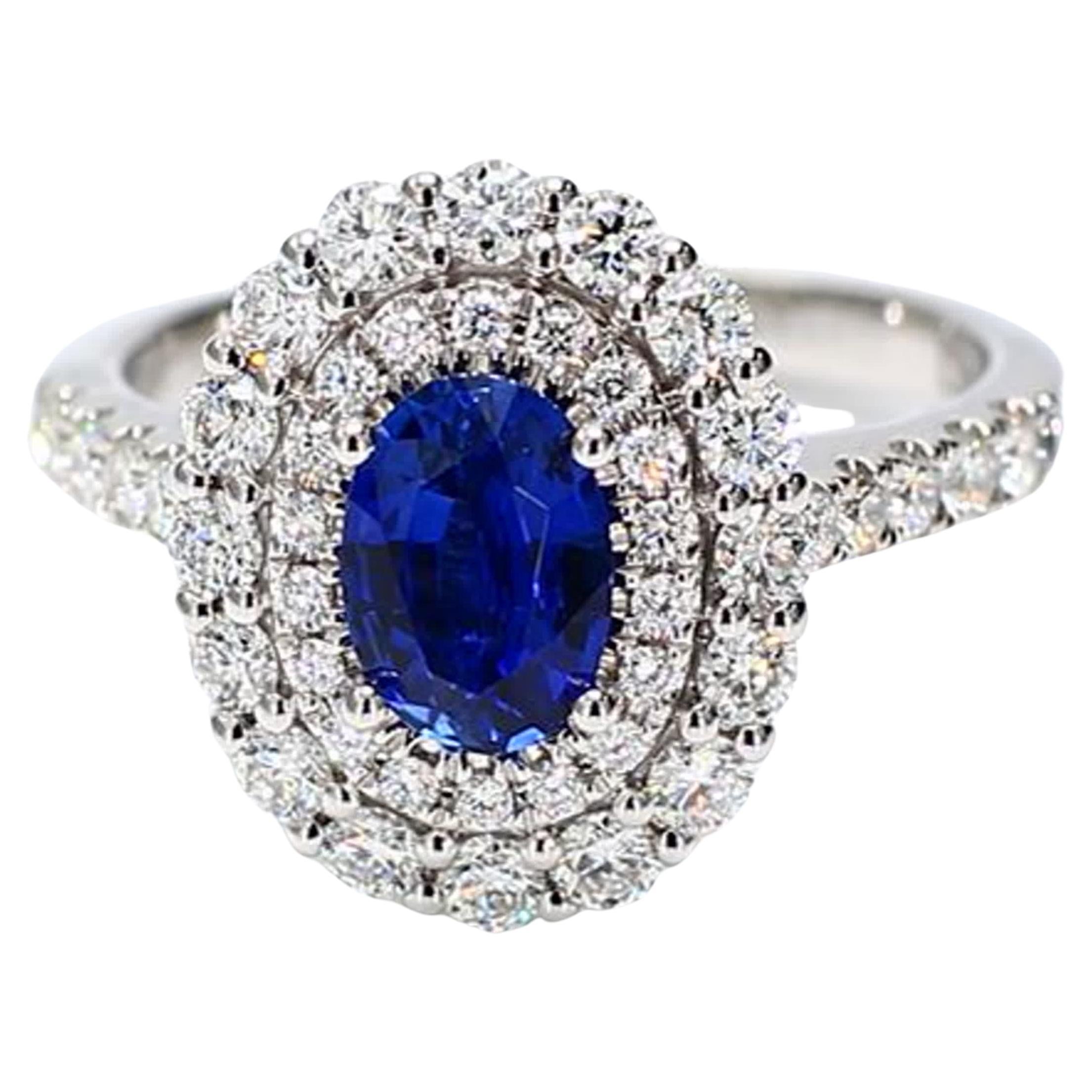 Natural Blue Oval Sapphire and White Diamond 1.97 Carat TW Gold Cocktail Ring For Sale