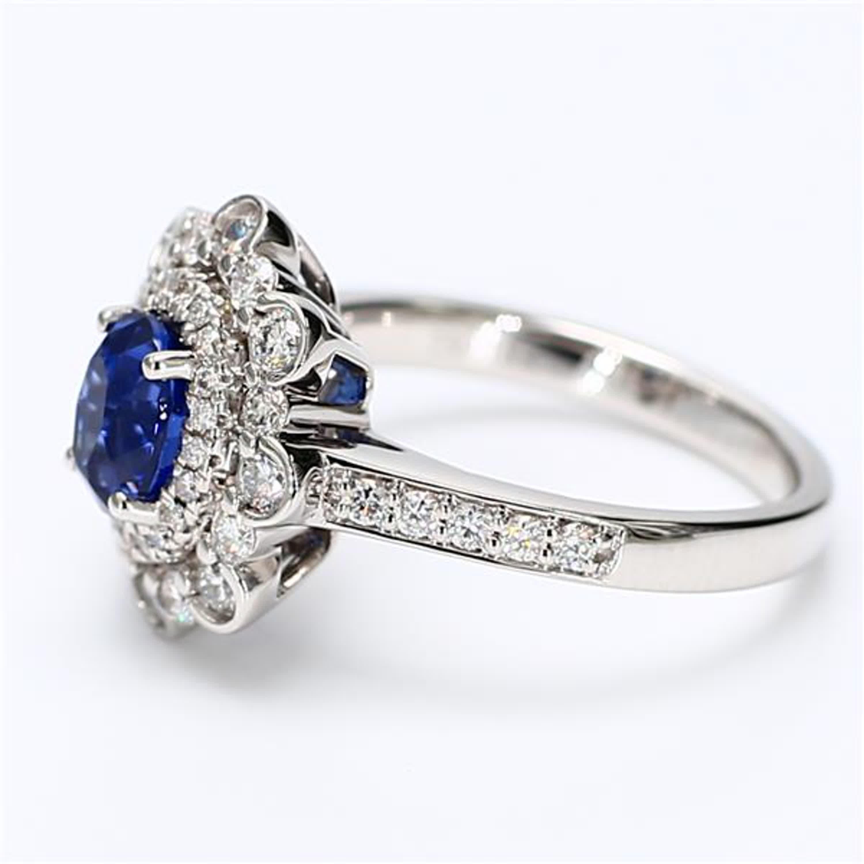 Contemporary Natural Blue Oval Sapphire and White Diamond 2.05 Carat TW Gold Cocktail Ring For Sale