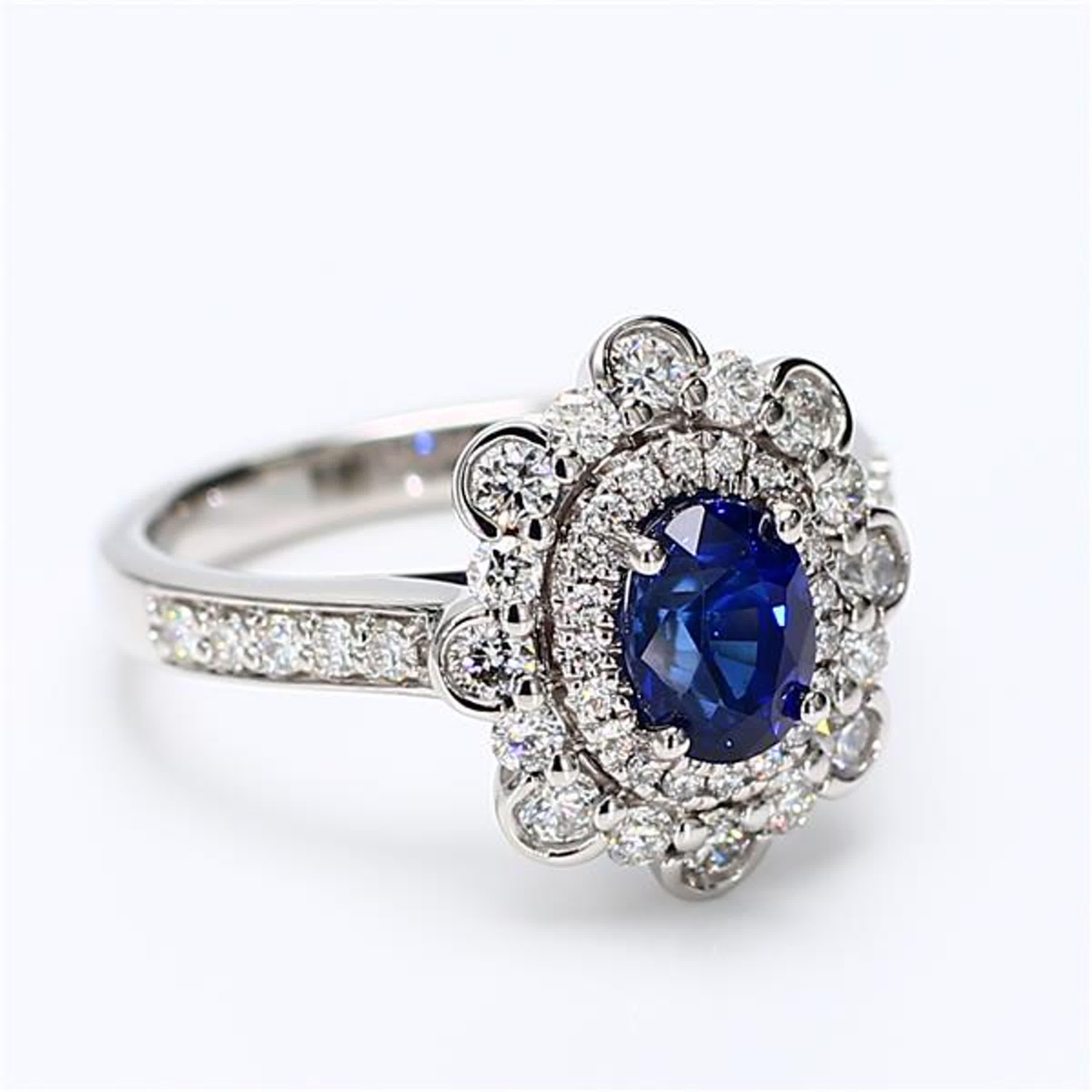 Natural Blue Oval Sapphire and White Diamond 2.05 Carat TW Gold Cocktail Ring For Sale 1