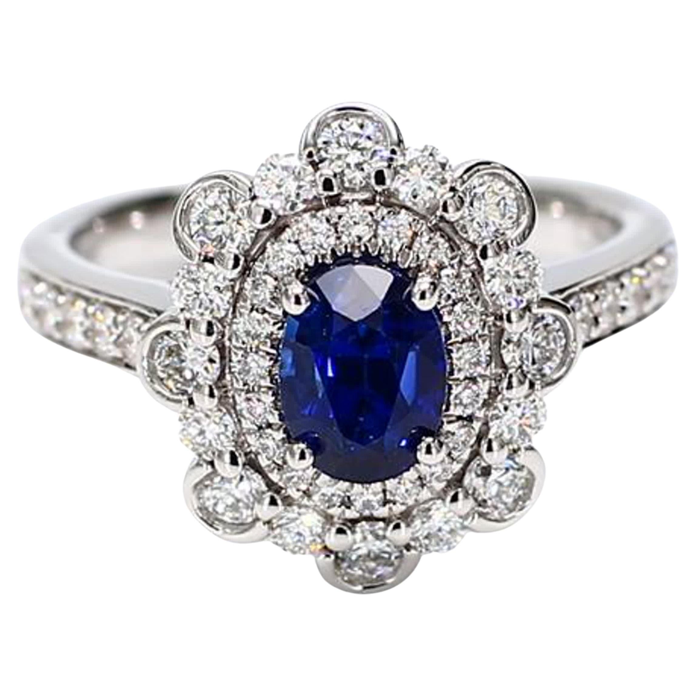 Natural Blue Oval Sapphire and White Diamond 2.05 Carat TW Gold Cocktail Ring For Sale
