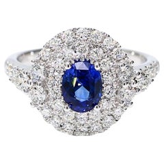 Natural Blue Oval Sapphire and White Diamond 2.06 Carat TW White Gold Ring
