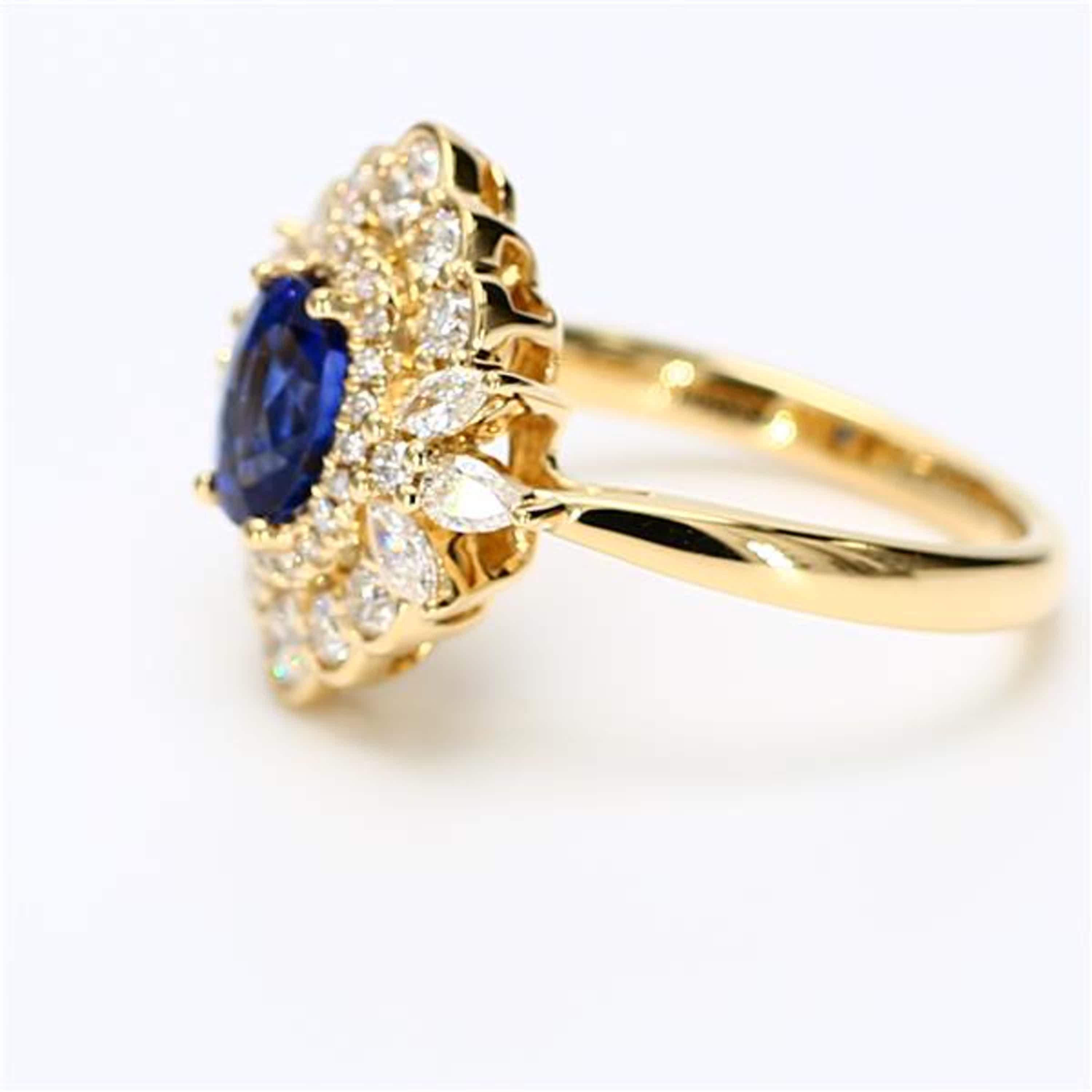 Contemporary Natural Blue Oval Sapphire and White Diamond 2.11 Carat TW Gold Cocktail Ring For Sale