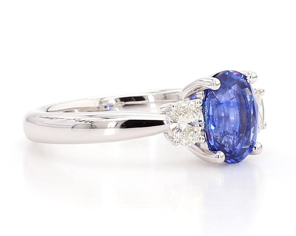 Oval Cut Natural Blue Oval Sapphire and White Diamond 2.37 Carat TW Gold Cocktail Ring For Sale