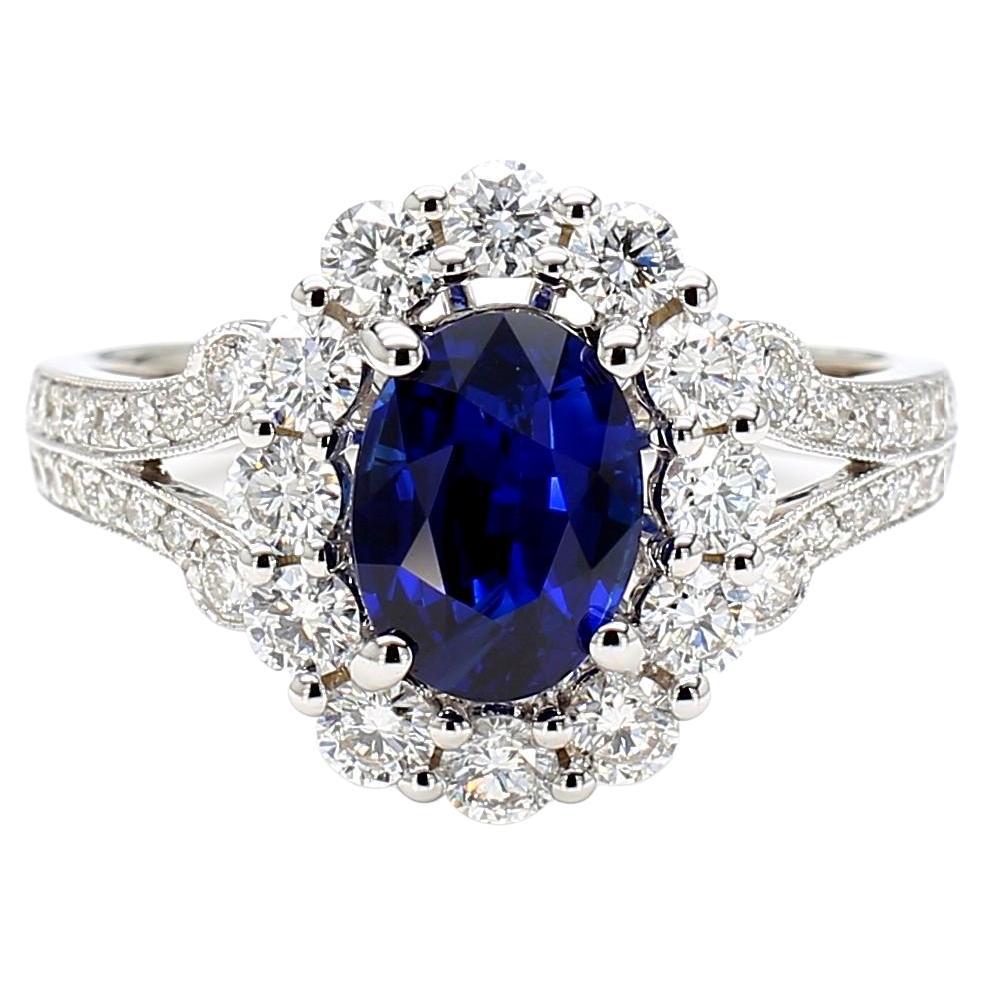Natural Blue Oval Sapphire and White Diamond 2.47 Carat TW Gold Cocktail Ring