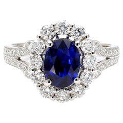 Natural Blue Oval Sapphire and White Diamond 2.47 Carat TW Gold Cocktail Ring