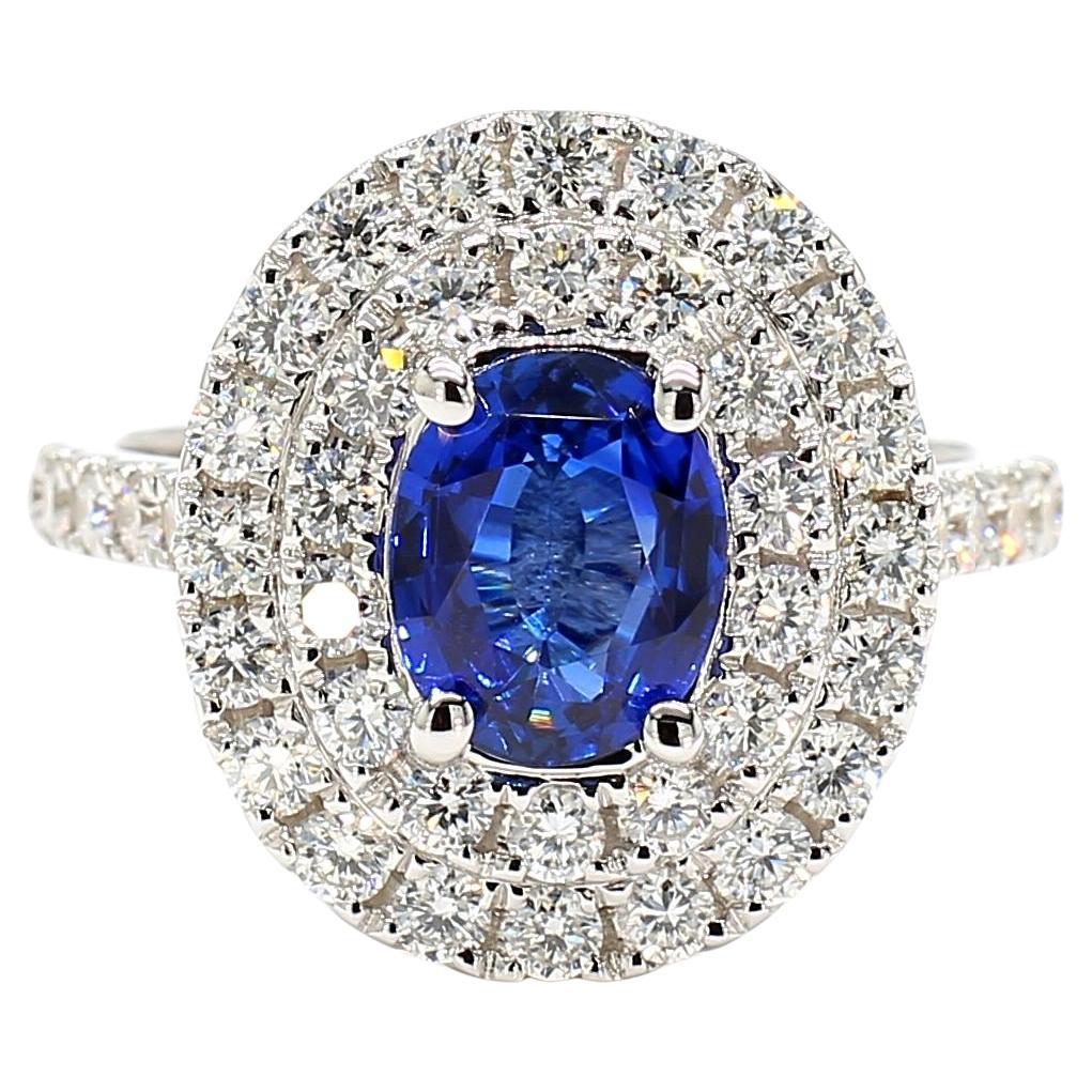 Natural Blue Oval Sapphire and White Diamond 2.76 Carat TW Gold Cocktail Ring