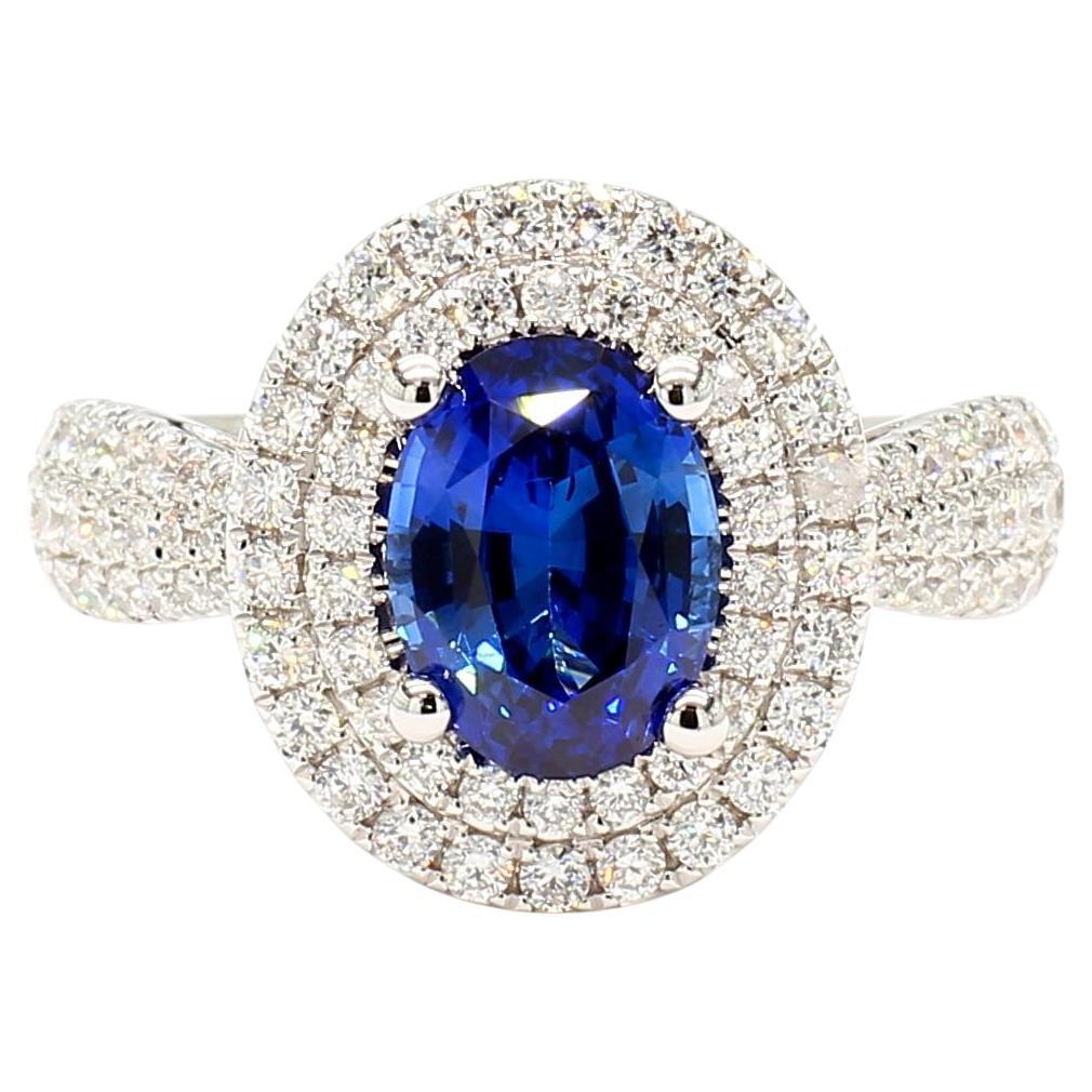 Natural Blue Oval Sapphire and White Diamond 2.81 Carat TW Gold Cocktail Ring