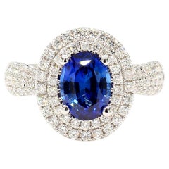 Natural Blue Oval Sapphire and White Diamond 2.81 Carat TW Gold Cocktail Ring