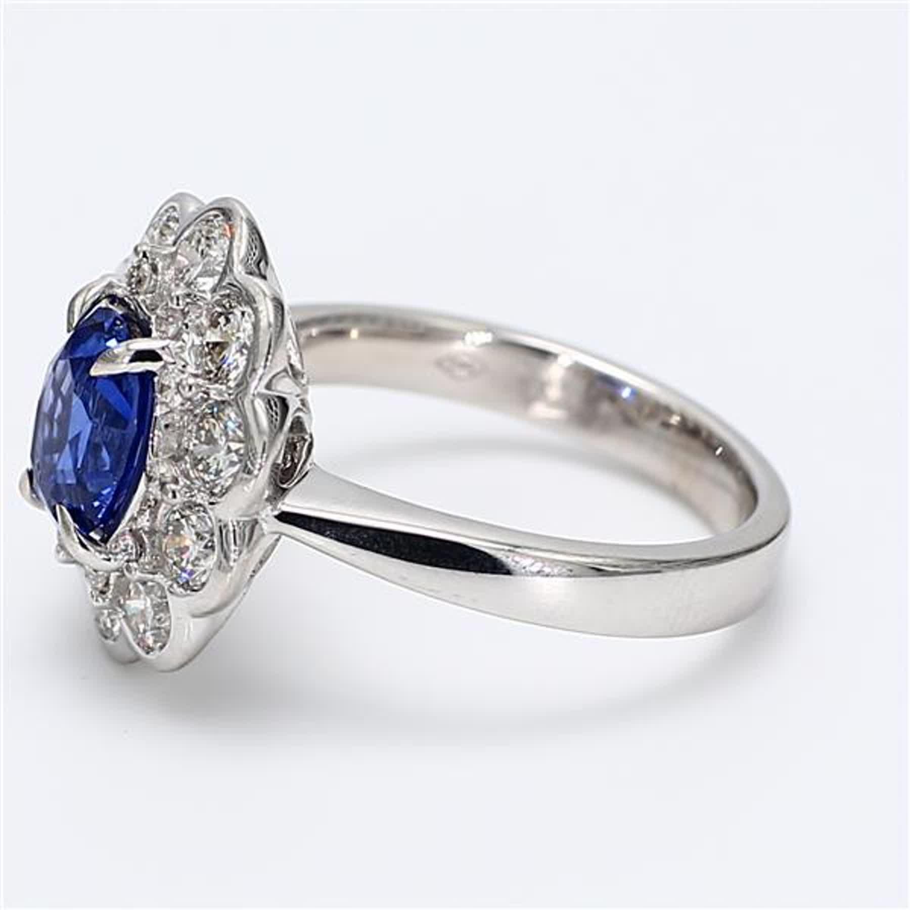 Contemporary Natural Blue Oval Sapphire and White Diamond 2.86 Carat TW Gold Cocktail Ring For Sale