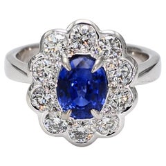Natural Blue Oval Sapphire and White Diamond 2.86 Carat TW Gold Cocktail Ring