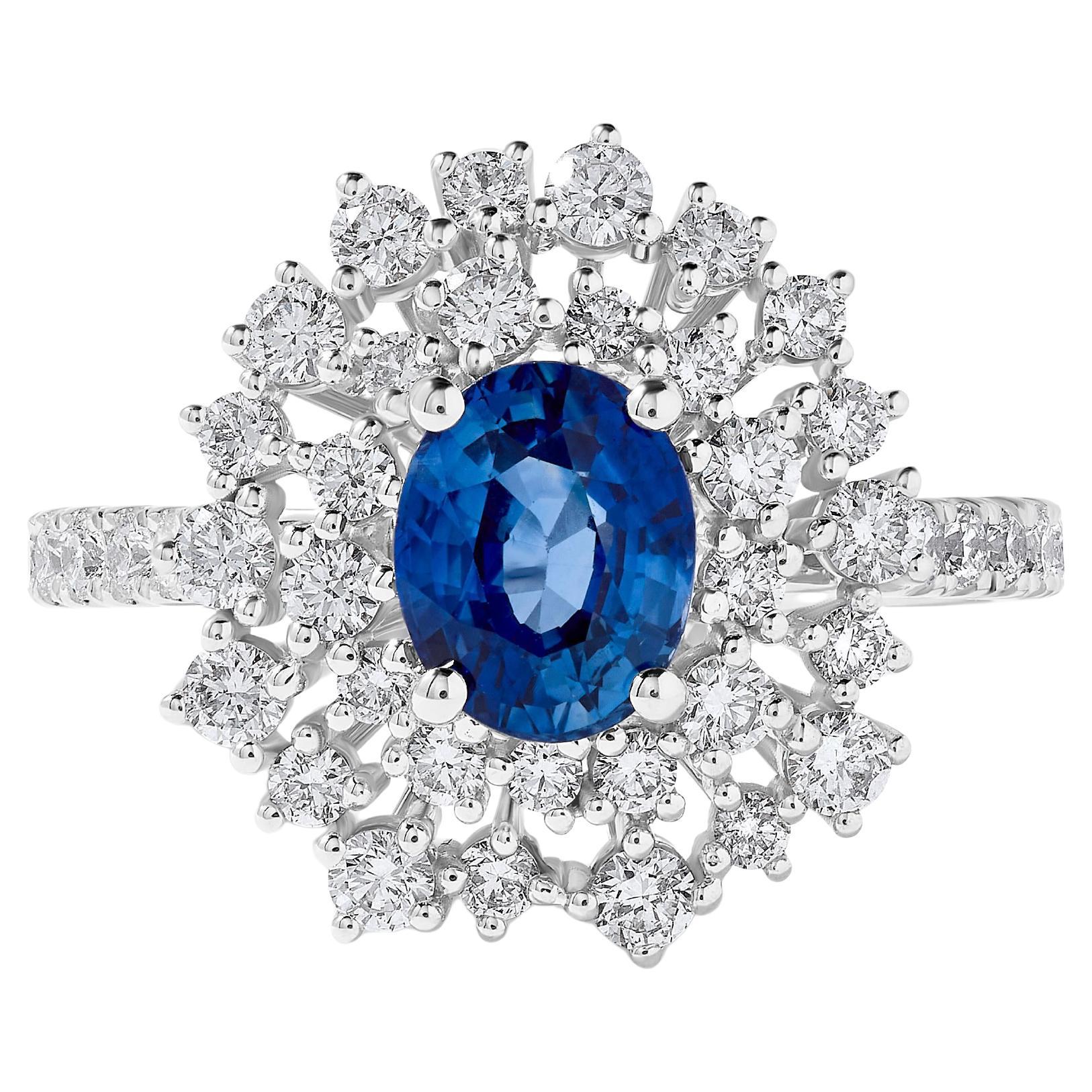 Natural Blue Oval Sapphire and White Diamond 2.86 Carat TW Gold Cocktail Ring For Sale
