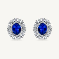 Natural Blue Oval Sapphire and White Diamond 3.48 Carat TW Gold Drop Earrings