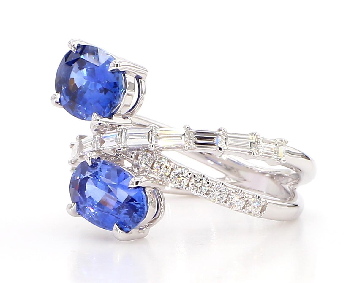 Contemporary Natural Blue Oval Sapphire and White Diamond 4.42 Carat TW Gold Cocktail Ring For Sale