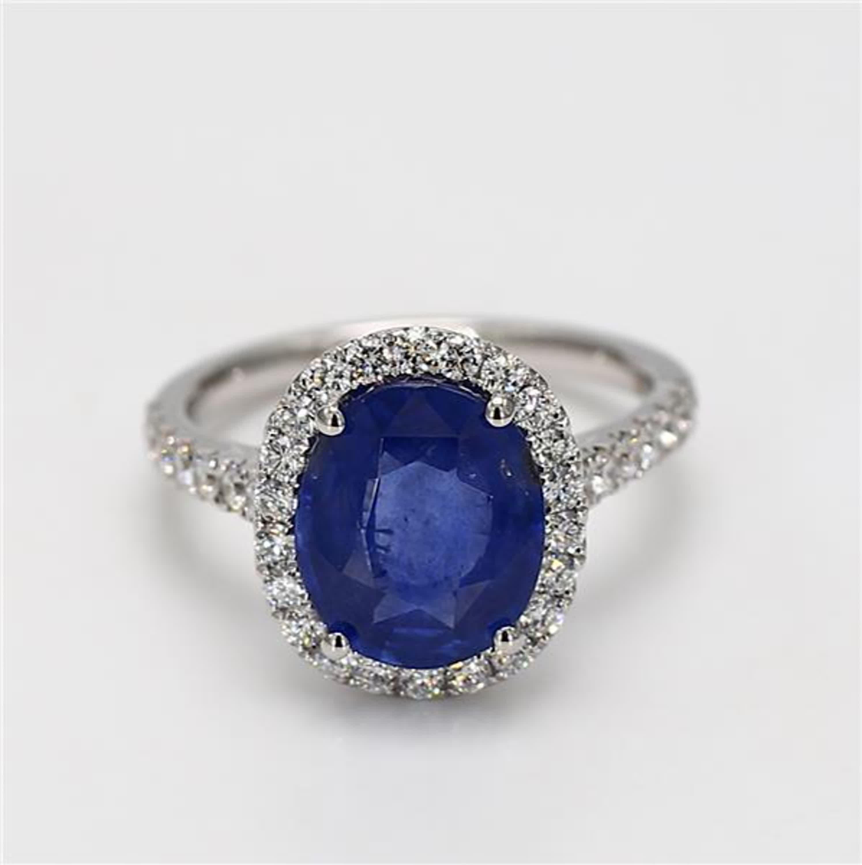 Contemporary Natural Blue Oval Sapphire and White Diamond 4.78 Carat TW Gold Cocktail Ring