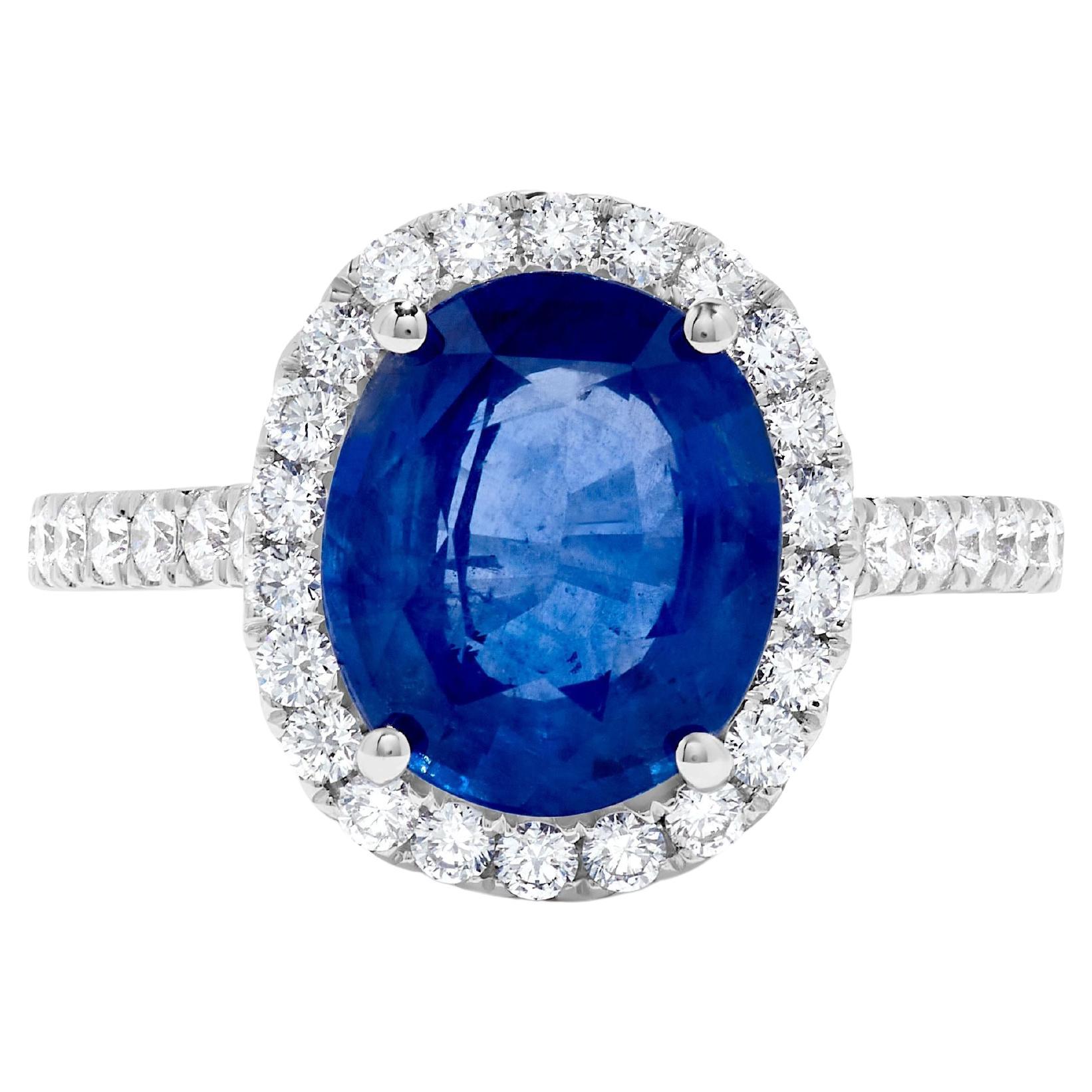 Natural Blue Oval Sapphire and White Diamond 4.78 Carat TW Gold Cocktail Ring