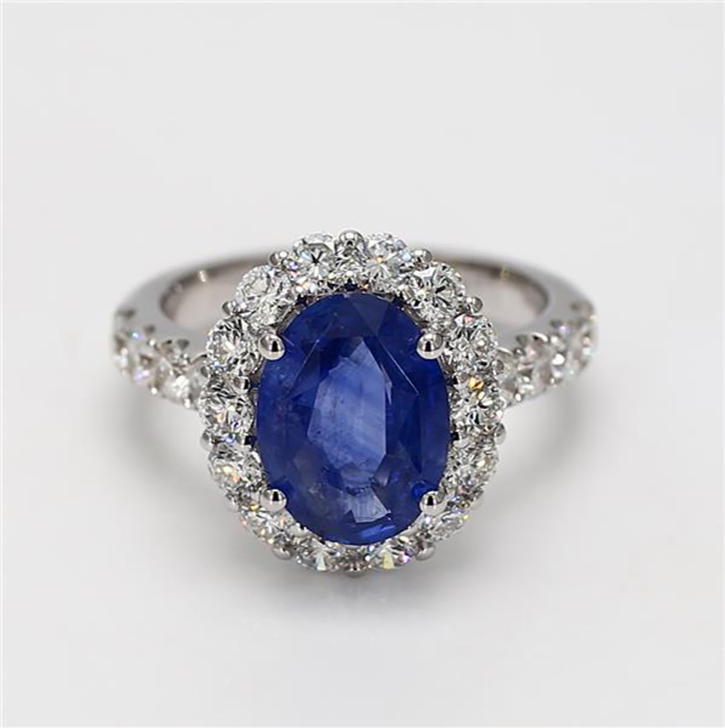 Contemporary Natural Blue Oval Sapphire and White Diamond 4.93 Carat TW Gold Cocktail Ring For Sale