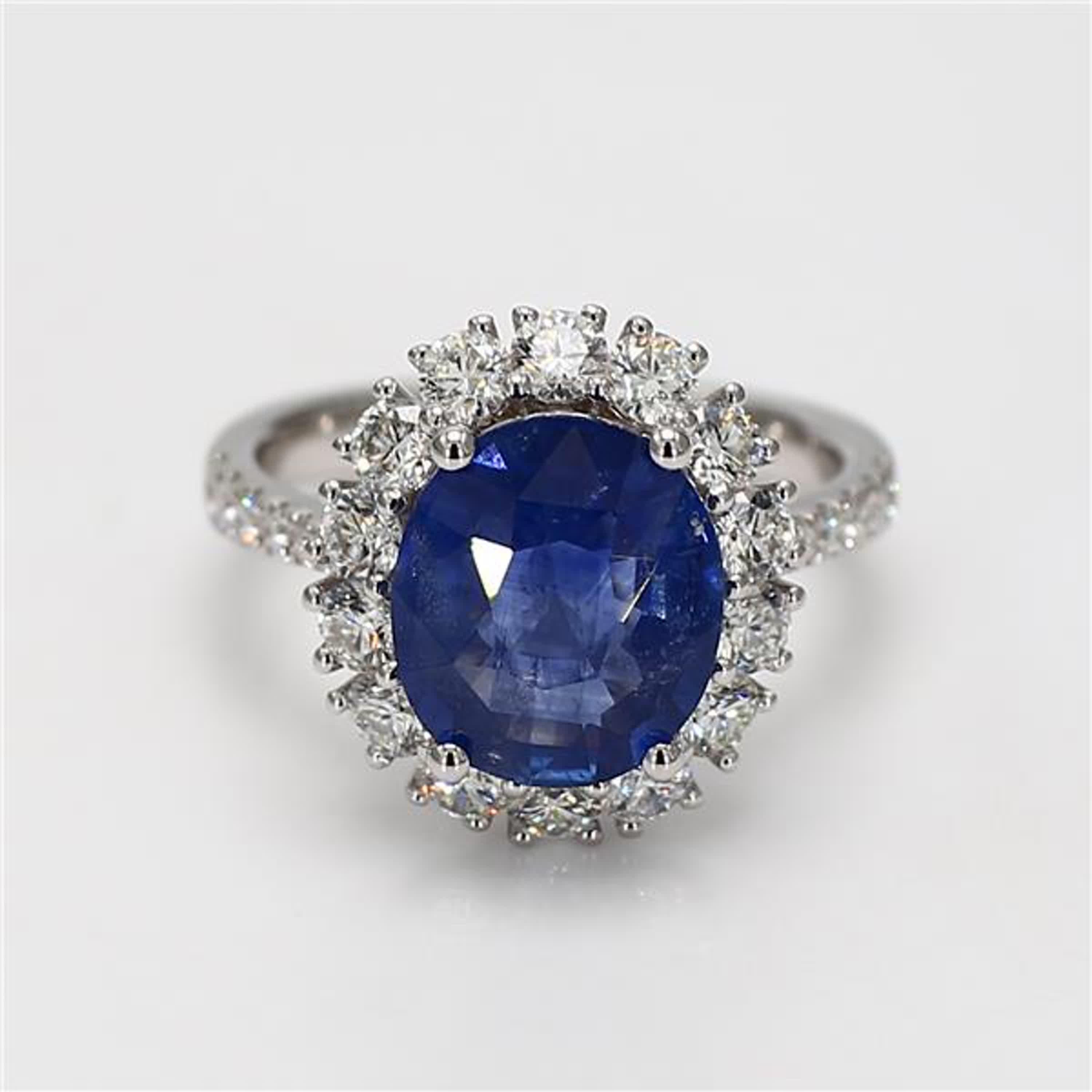 Contemporary Natural Blue Oval Sapphire and White Diamond 5.51 Carat TW Gold Cocktail Ring For Sale