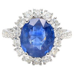 Natural Blue Oval Sapphire and White Diamond 5.51 Carat TW Gold Cocktail Ring