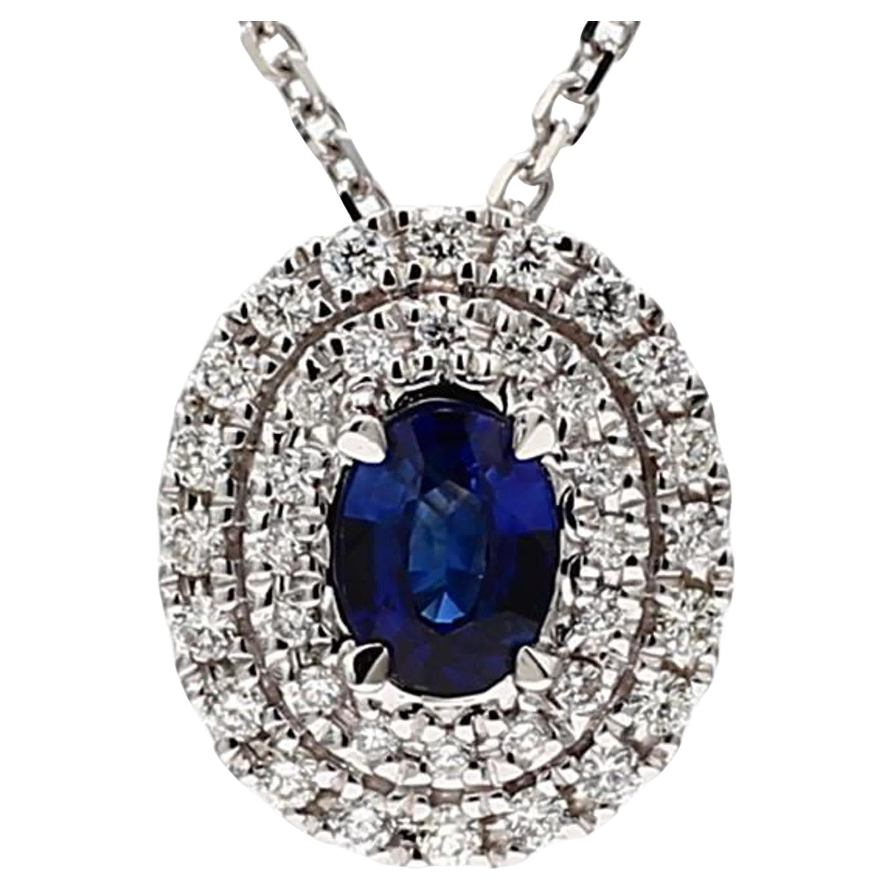 Natural Blue Oval Sapphire and White Diamond .67 Carat TW White Gold Pendant For Sale