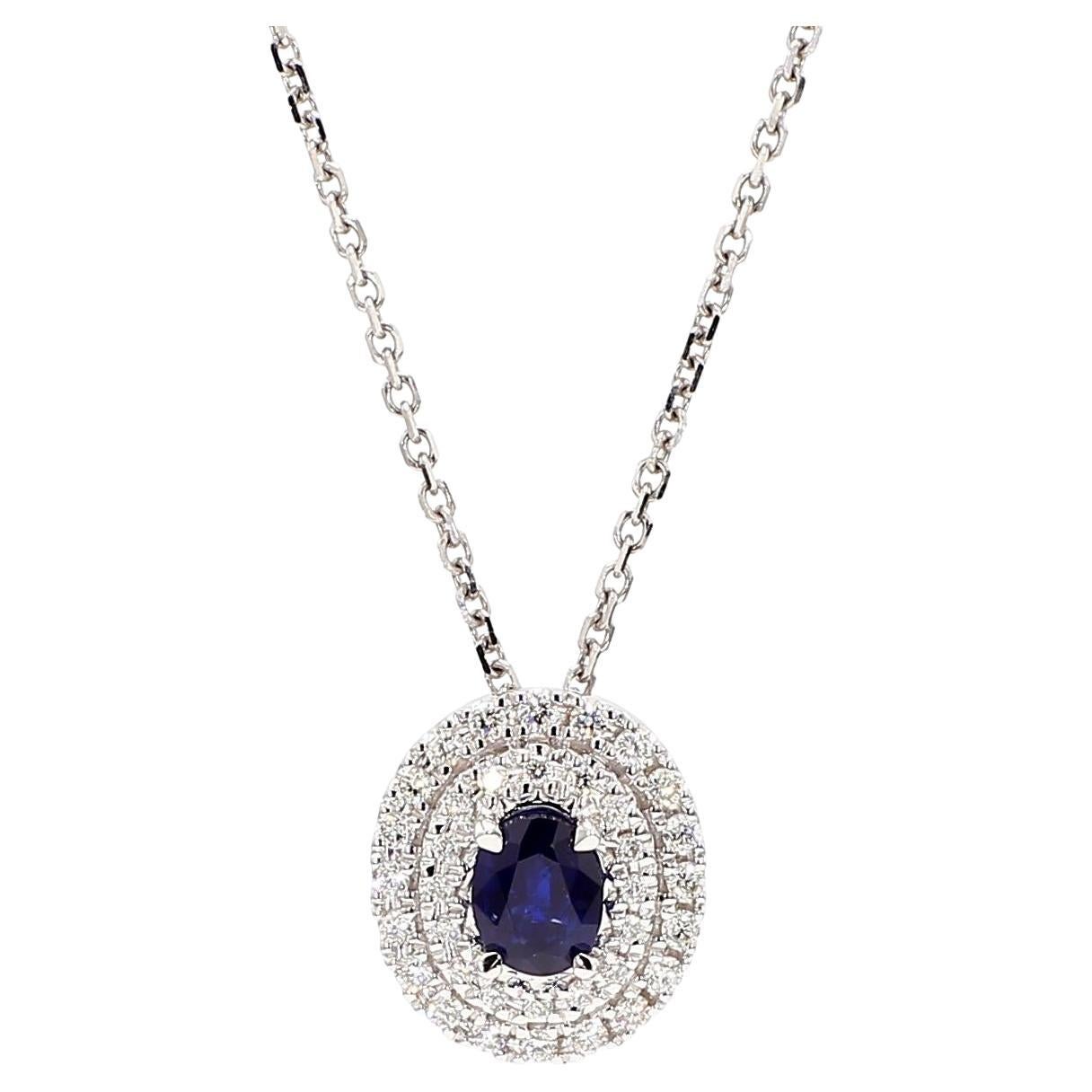 Natural Blue Oval Sapphire and White Diamond .67 Carat TW White Gold Pendant