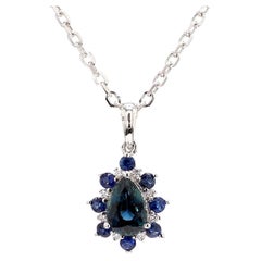 Ciondolo a goccia in oro con zaffiro blu perlato naturale e diamante bianco da 0.61 carati TW