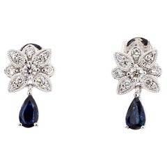 Orecchini a goccia in oro con zaffiro blu naturale e diamante bianco da 0.80 carati TW