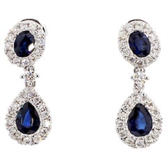 Natürlicher blauer birnenförmiger Saphir und weißer Diamant 1.66 Karat TW Gold Tropfenohrringe