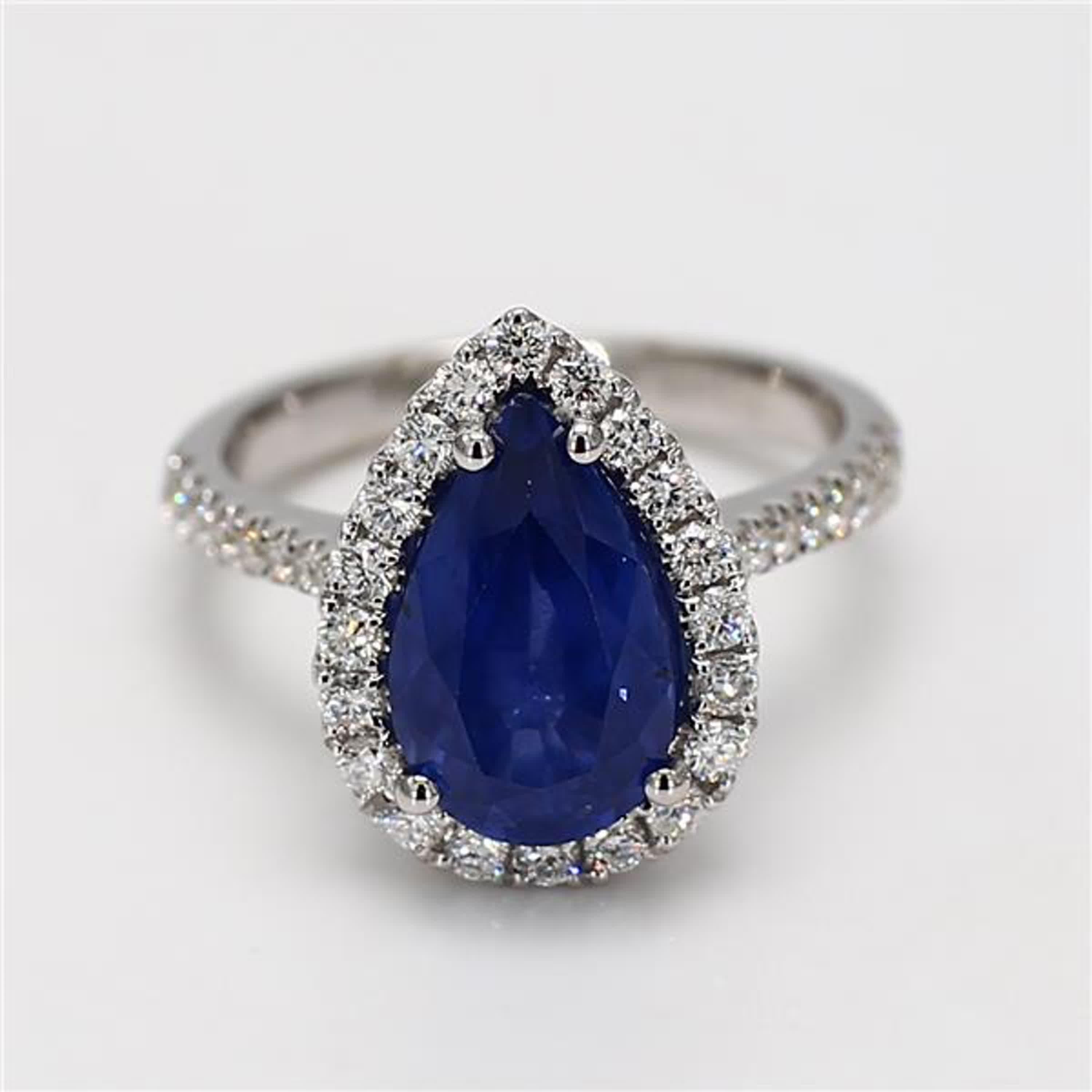 Contemporary Natural Blue Pear Sapphire and White Diamond 4.29 Carat TW Gold Cocktail Ring For Sale