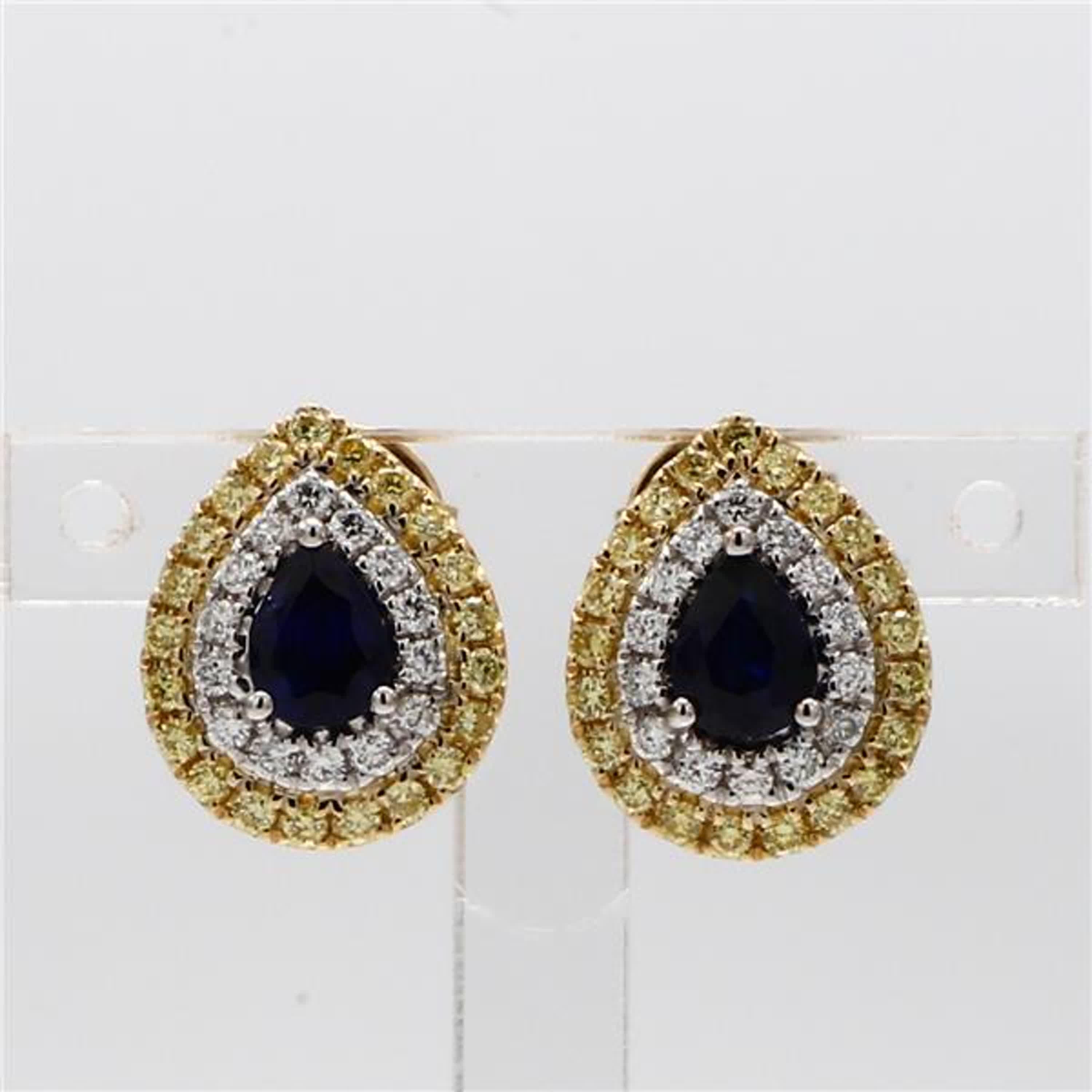 RareGemWorld's classic sapphire earrings. Mounted in a beautiful 18K Yellow and White Gold setting with natural pear cut blue sapphires. The sapphires are surrounded by natural round yellow diamond melee and natural round white diamond melee. These