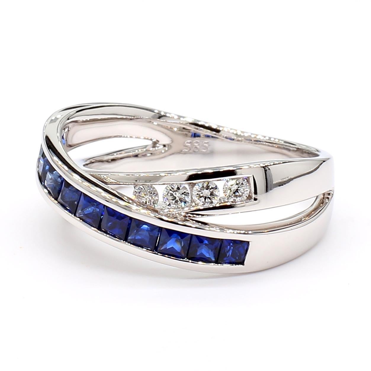 RareGemWorld's intriguing sapphire band. Mounted in a beautiful 14K White Gold setting with natural princess cut blue sapphires complimented by natural round white diamond melee. This band is guaranteed to impress and enhance your personal