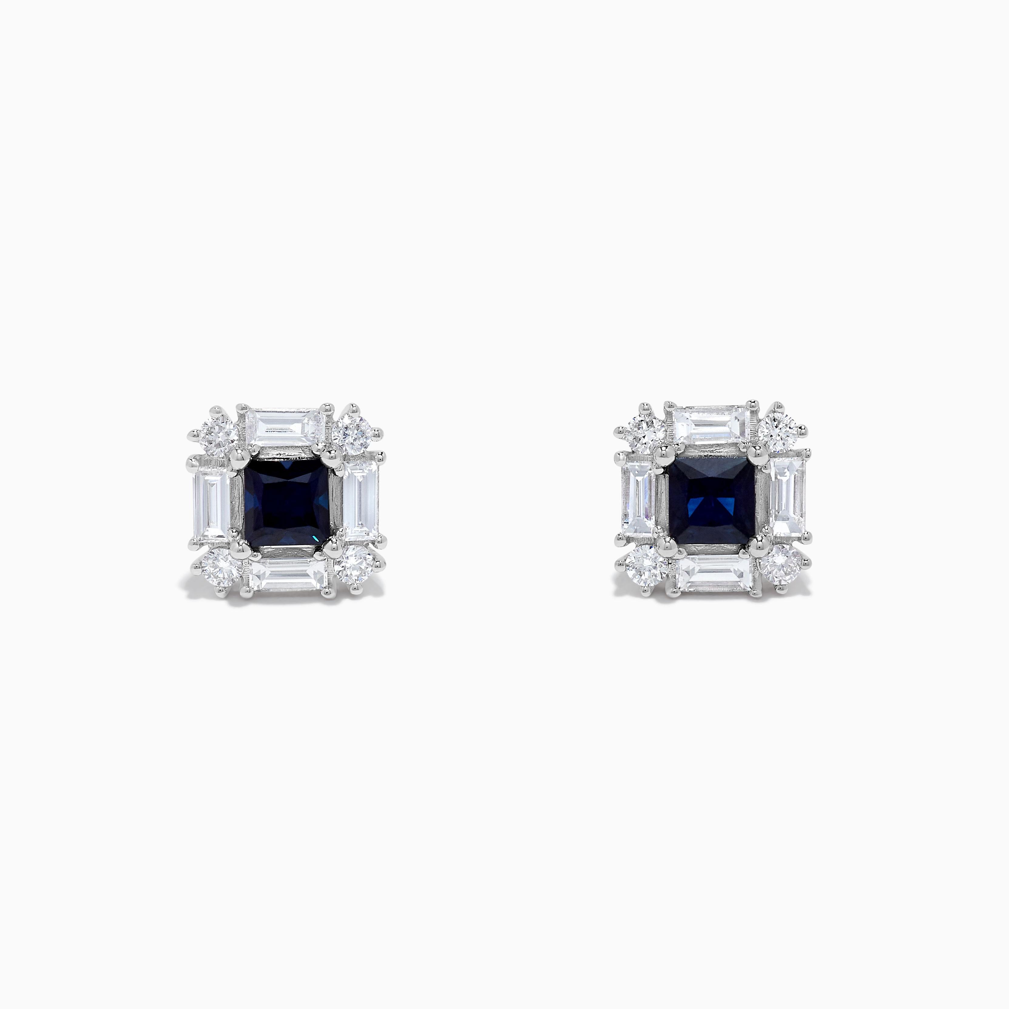RareGemWorld's classic sapphire earrings. Mounted in a beautiful 18K White Gold setting with natural princess cut blue sapphires. The sapphires are surrounded by natural round white diamond melee and natural baguette cut white diamonds. These